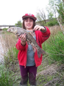 Selah with a sucker (Souris River, Manitoba, Canada)