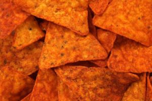 2993645 - hot and spicy corn chips. abstract food textures.