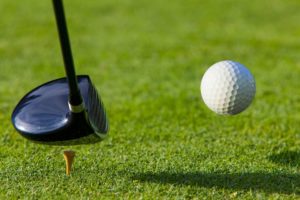 15807939 - golf ball hit off the tee with driver on golf course