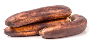 52909633 - overripe bananas in front of a white background.