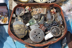 63187384 - antiques in the suitcase. flea market